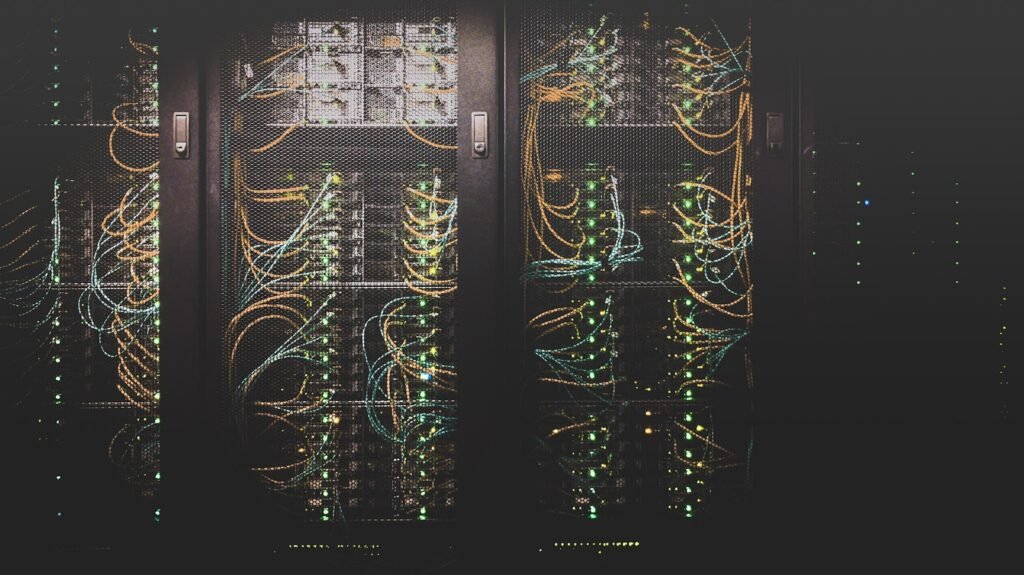 Server racks in a data center, representing the GCC sovereign AI infrastructure buildout driving 2026 hiring demand
