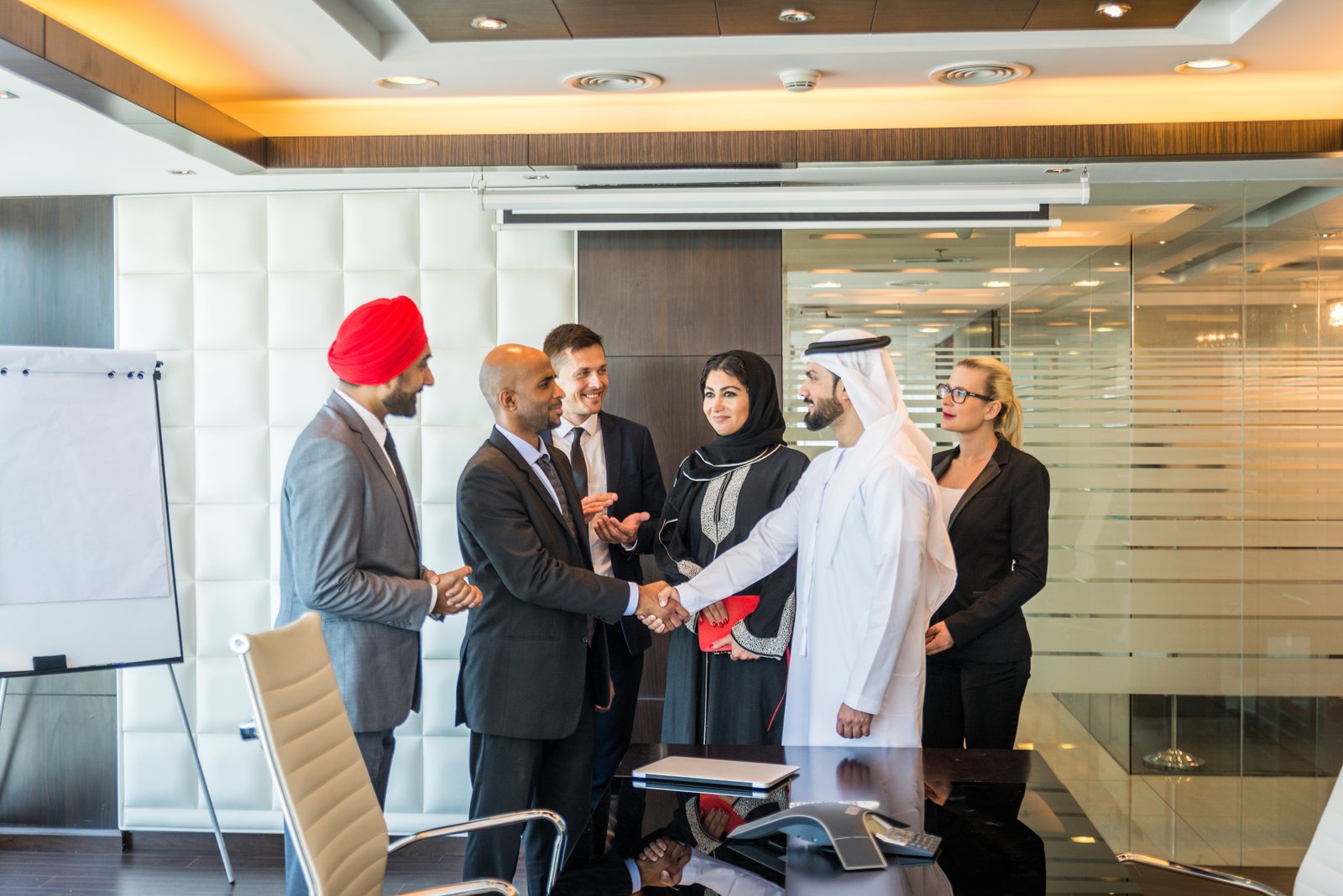 Business team discussing candidate integration in Dubai